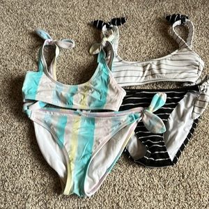 2 sets of matching swimsuits.